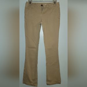 Tan beige slacks pants   side and back pockets  midrise boot cut khakis